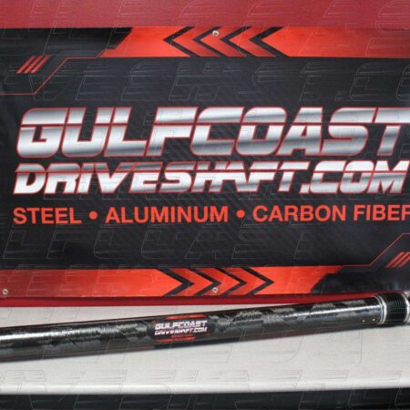 Carbon fiber slip shaft for 2010-2015 Camaro ZL1, featuring a sleek black finish and performance U-joints.