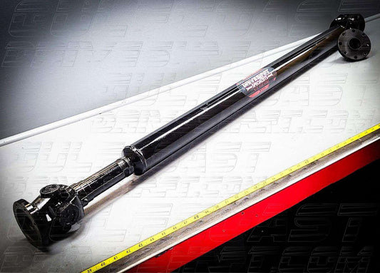 Black Jeep Gladiator 1350 Series CV driveshaft combo featuring solid U-joints and flanges, designed for optimal durability.