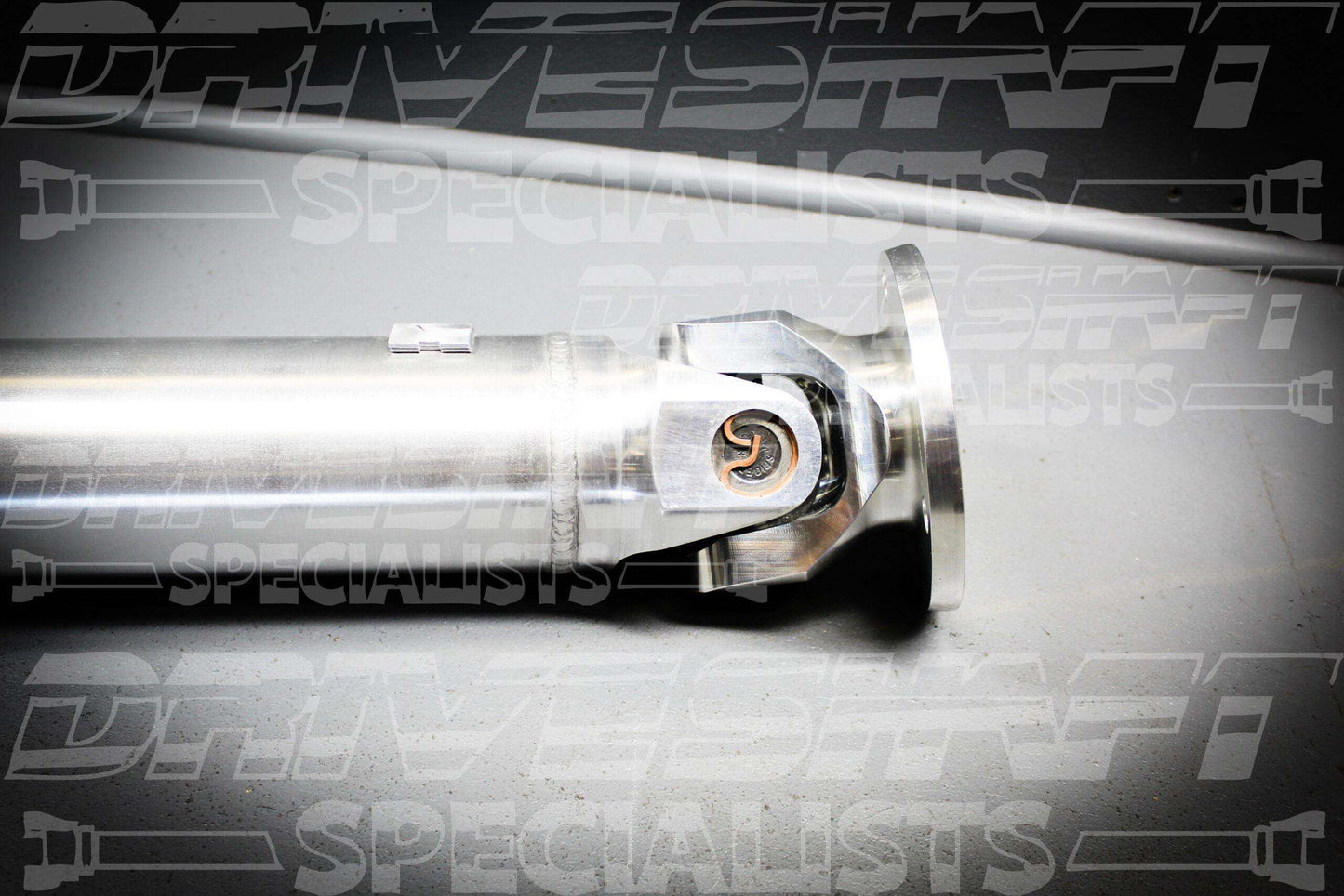 Aluminum driveshaft for 2008-09 Pontiac G8, featuring a 3.5" diameter and upgraded non-greaseable u-joints.