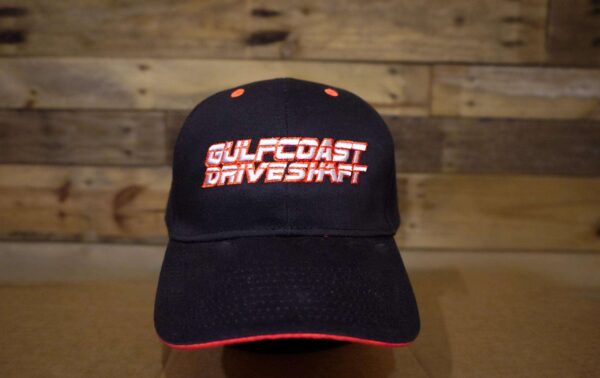 Black Gulf Coast Driveshaft cap with red trim, pre-curved visor, and adjustable Velcro strap. Bold logo in front.